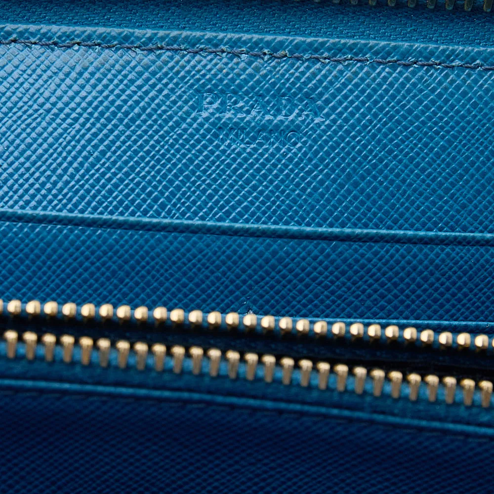 Prada Blue Saffiano Leather Zip Around Wallet..